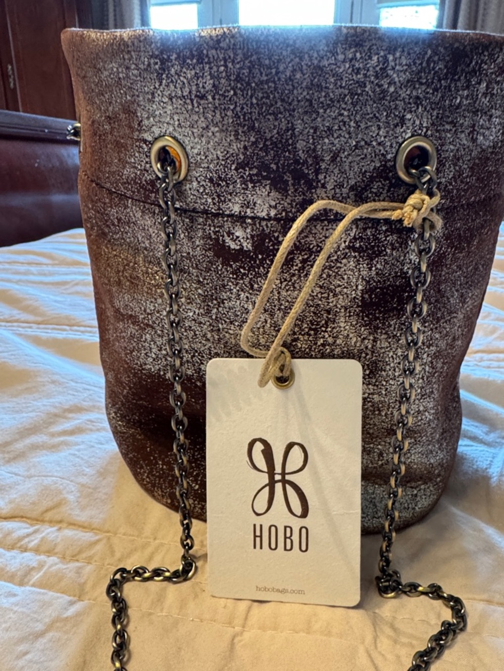 HOBO Brown and Silver Metallic Bucket Hobo with Chain Strap